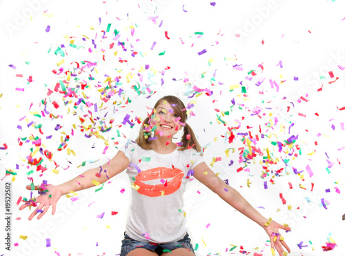 young girl in confetti over white