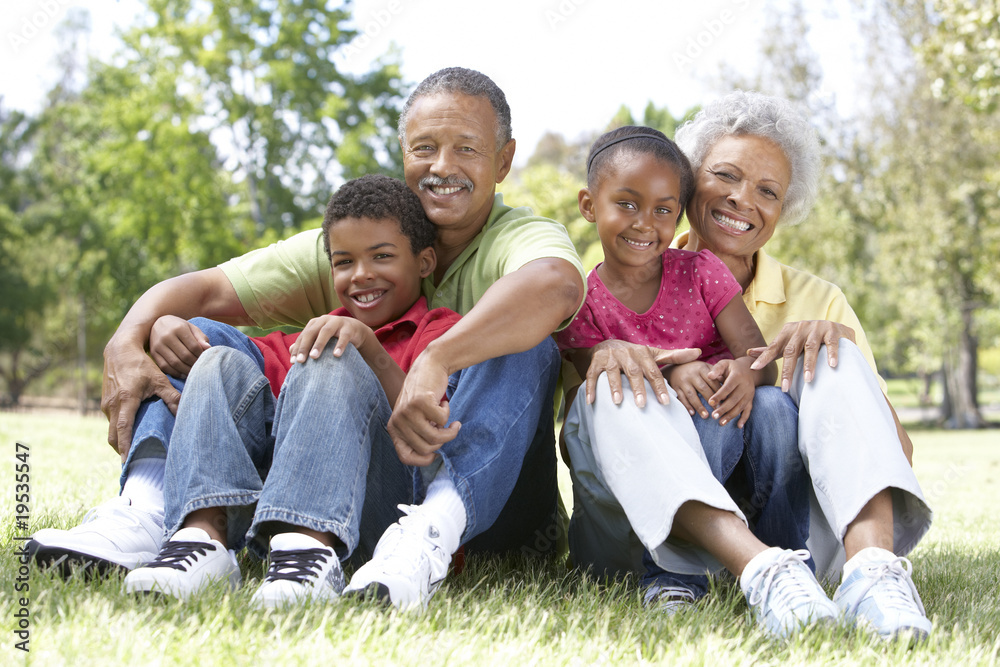 Grandparents In Park With Grandchildren