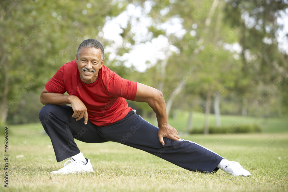 Senior Man Exercising In Park Senior Man Exercising In Park