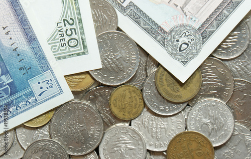 Outdated Lebanese coins and paper bills