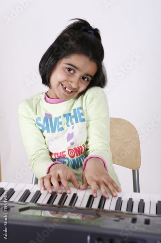 girl playing music