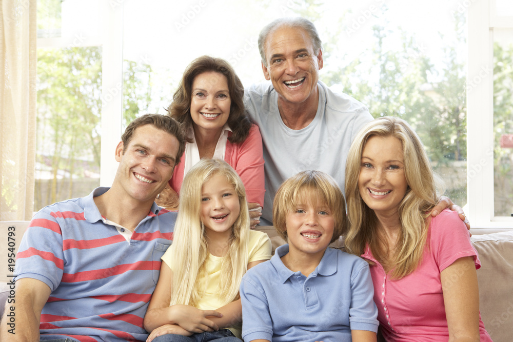 Extended Family Relaxing At Home Together