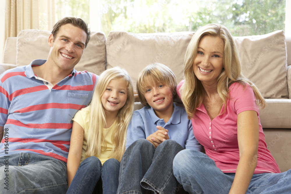 Family Relaxing At Home Together