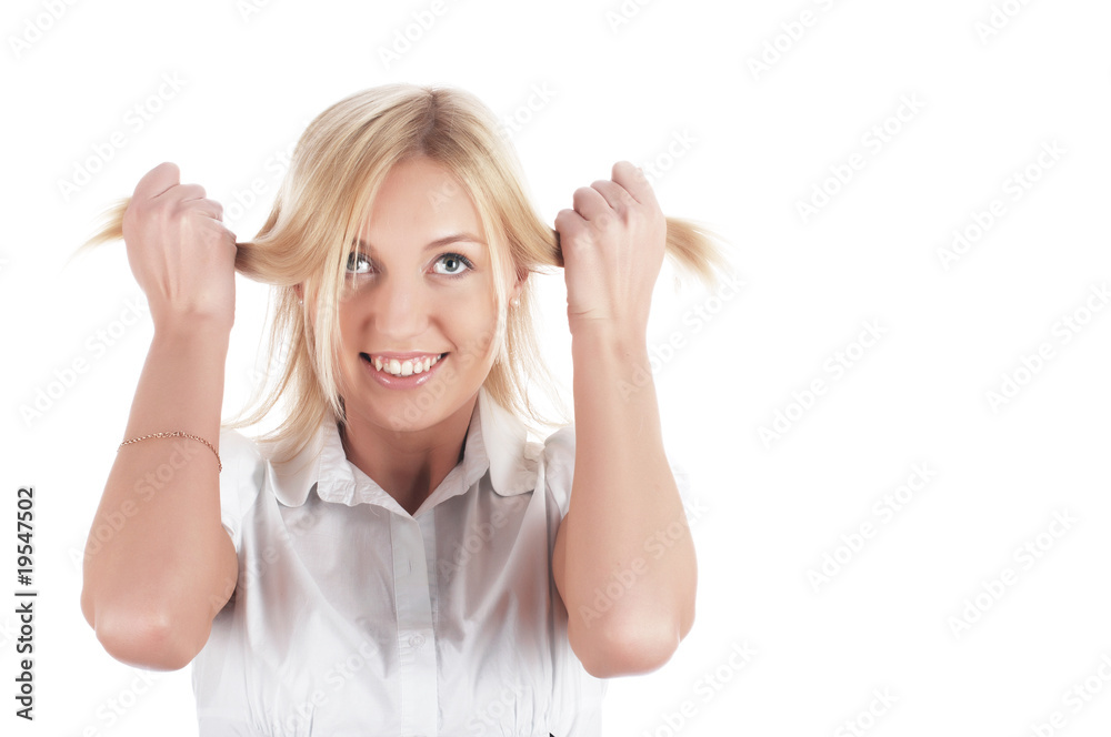 The cheerful charming blonde in a white shirt The cheerful charming blonde in a white shirt