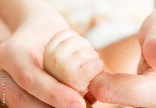 Mother's and baby's hands