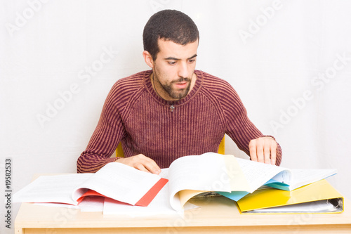 young man studying photo