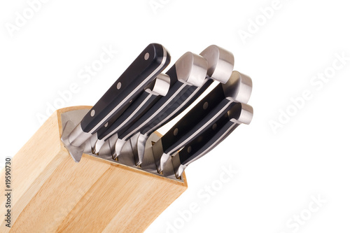 Set of kitchen knifes isolated on white photo