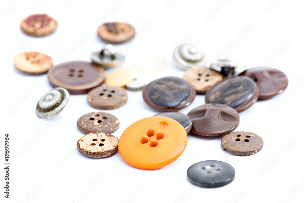 multicolored cloth sewing buttons isolated at white backgrount multicolored cloth sewing buttons isolated at white backgrount