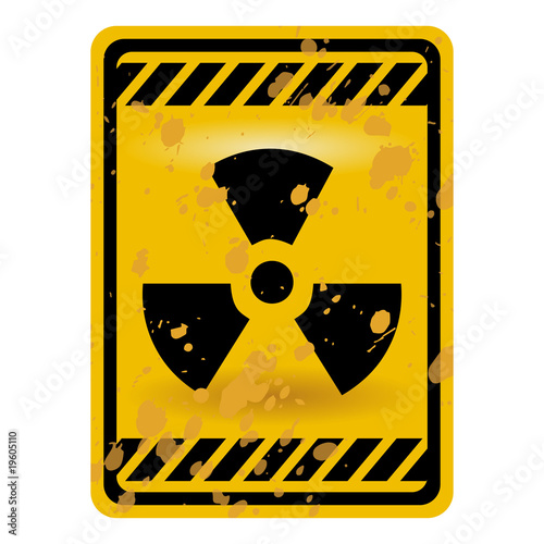 Grunge radioactivity warning sign isolated over white