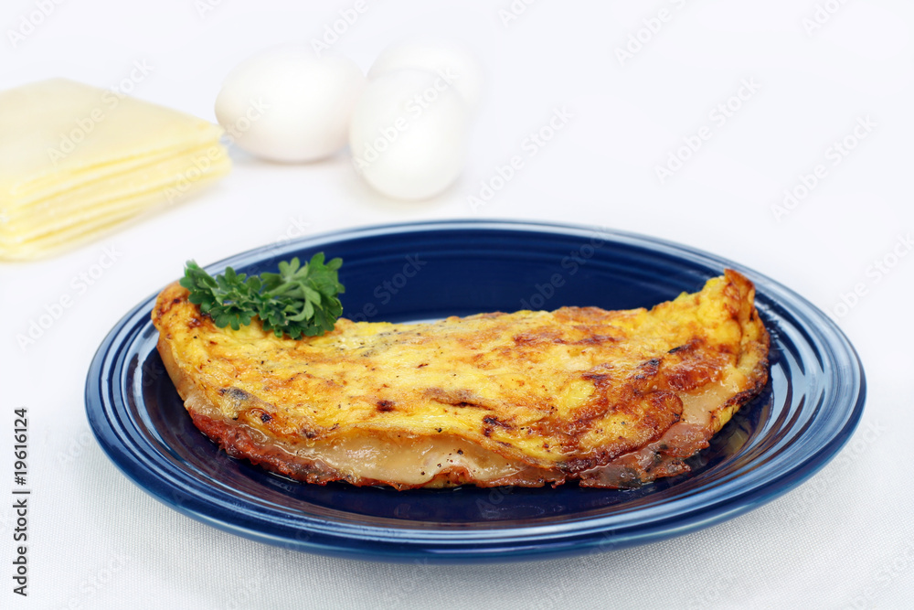 Omelet of ham and cheese with copy space.