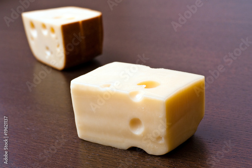 Two pieces of cheese