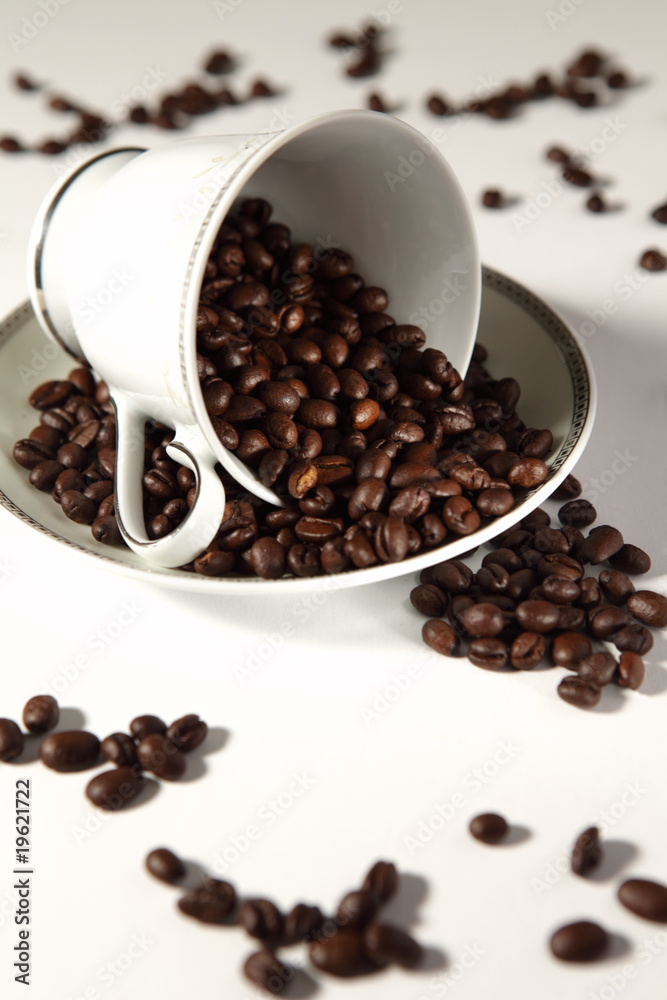 A cup with coffee beans