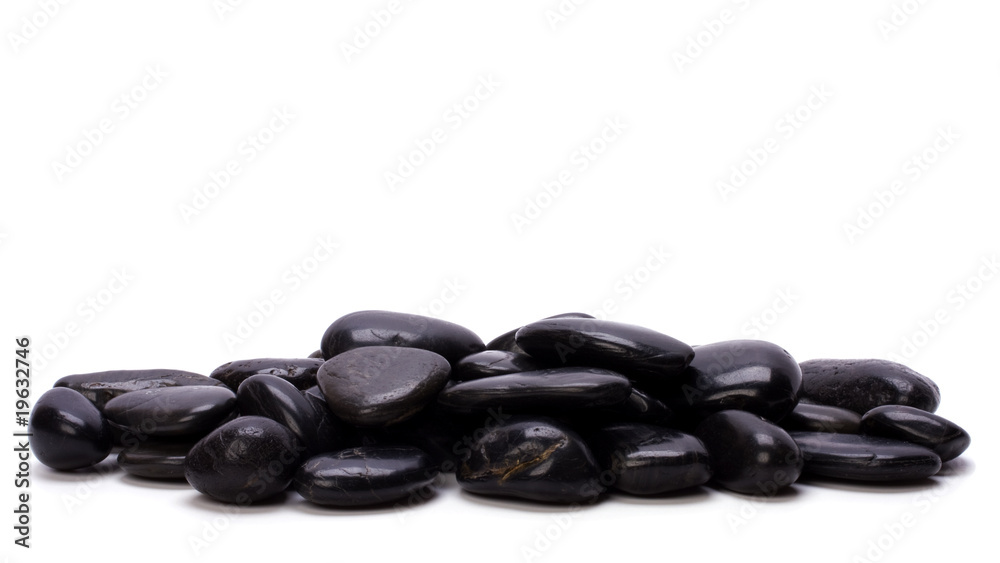 Heap of black pebbles isolated on white background Heap of black pebbles isolated on white background