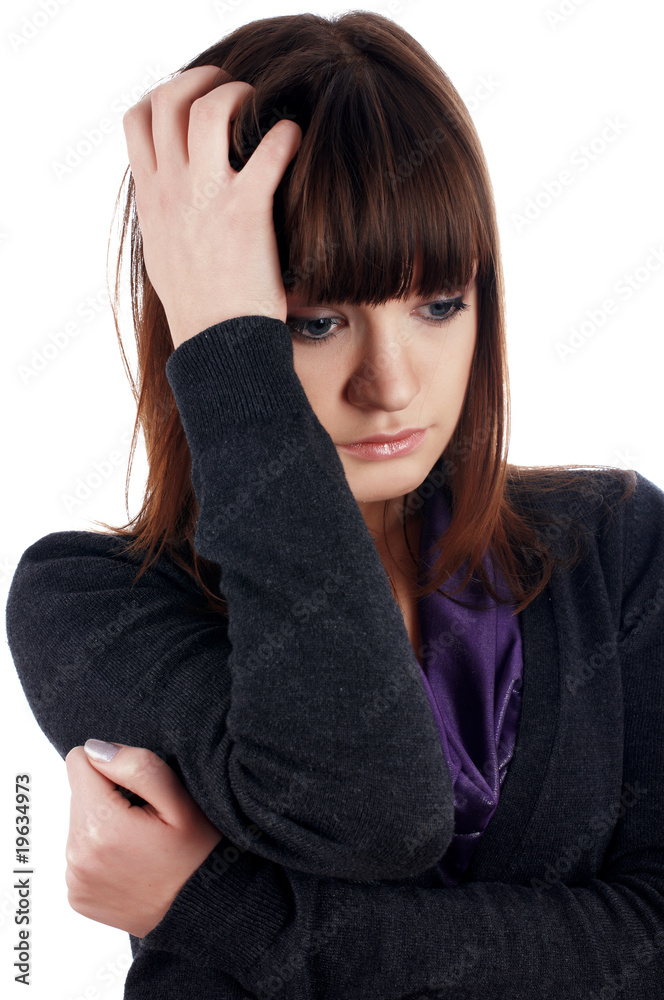 The cheerful charming brunette female in dark blue sweater The cheerful charming brunette female in dark blue sweater