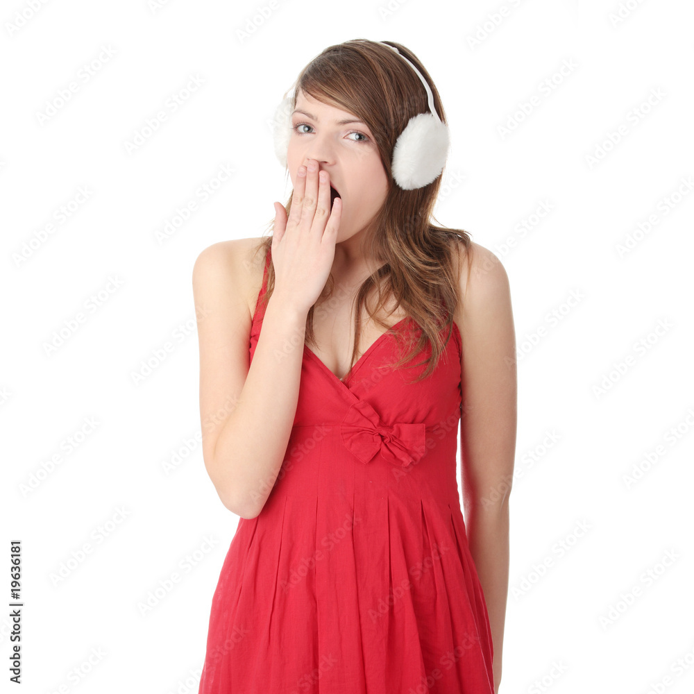 Pretty young teen girl wearing white earmuff Pretty young teen girl wearing white earmuff