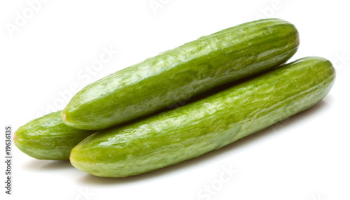 Three cucumbers isolated on white