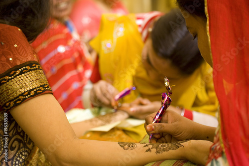 applying henna on hand, bride , traditional Hindu wedding , Rajasthan, India 