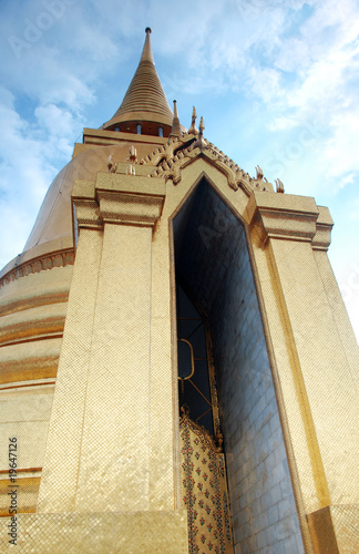 Golden buddhist temple with open door