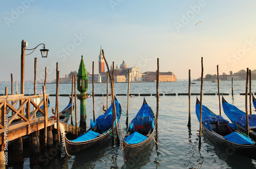 Gondolas in Venice at sunset © netrun78