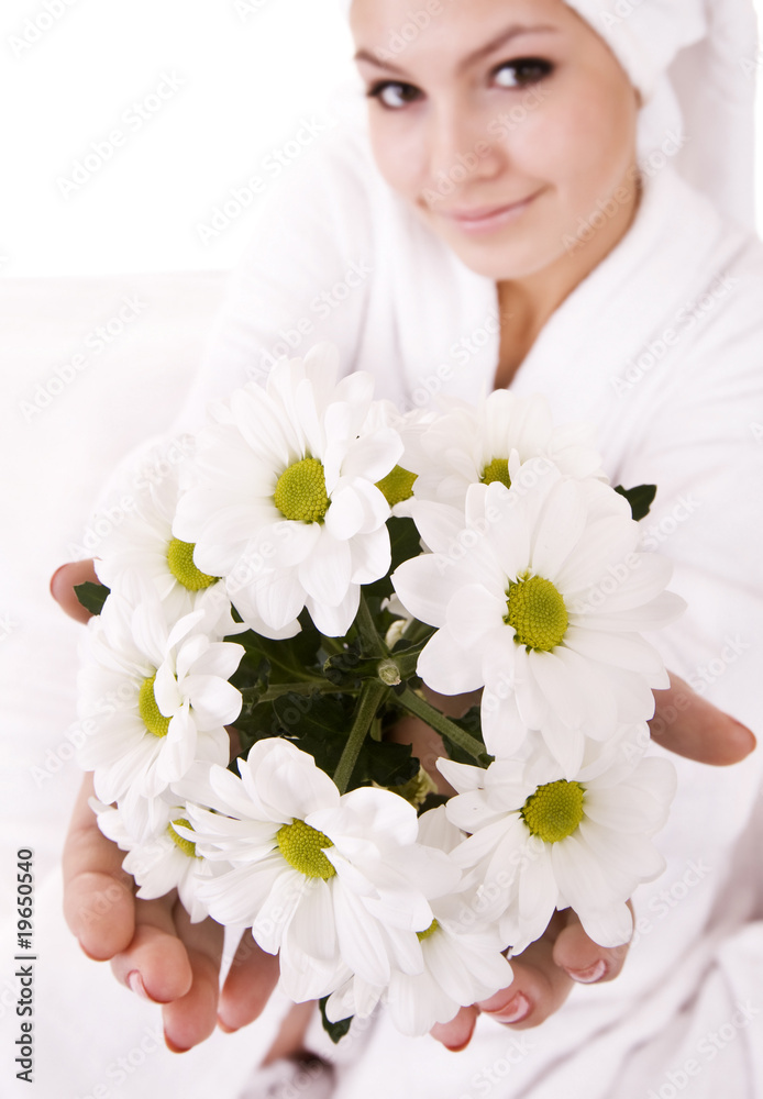 Girl with camomile and white towel on head. Isolated.