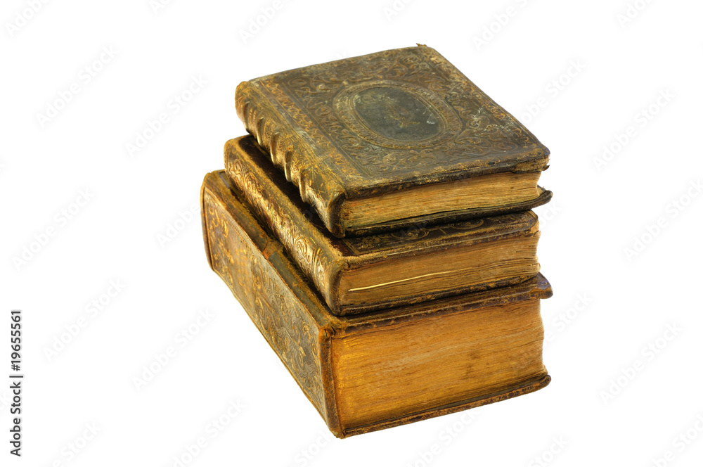 pile of three 19th century books isolated on white