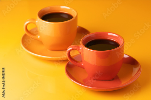 Multicolored cups of coffee