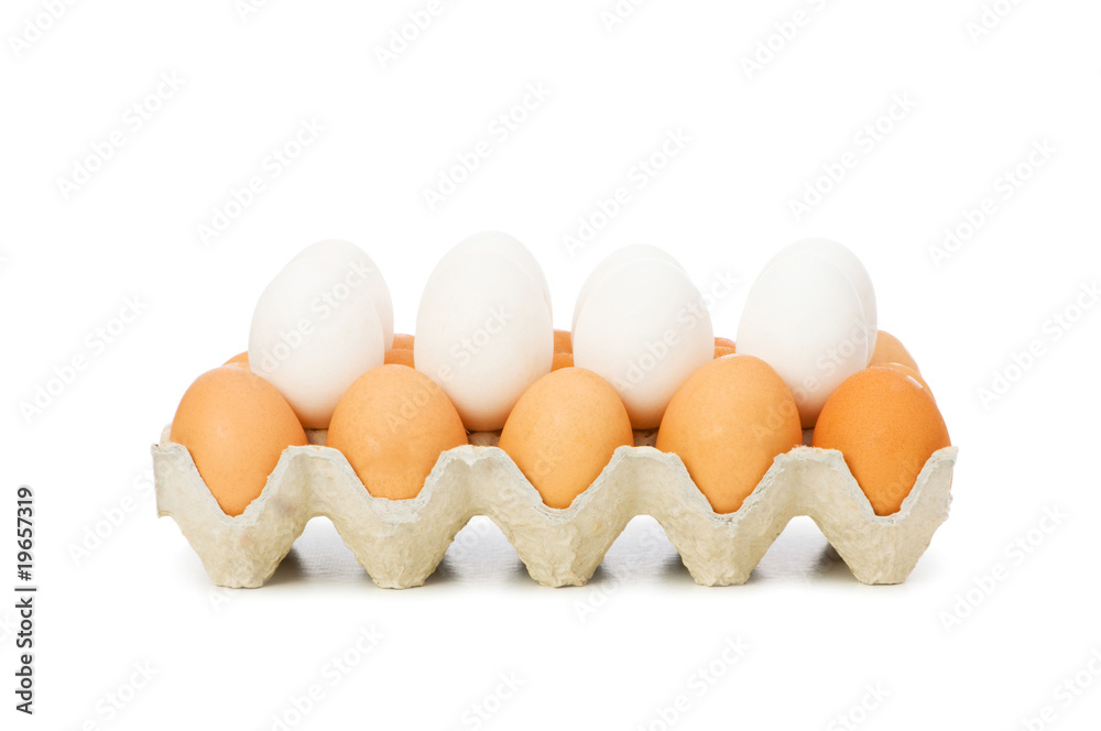 Lots of eggs in the carton isolated on white Lots of eggs in the carton isolated on white