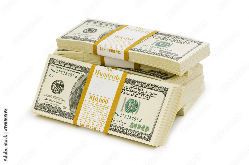 Stack of dollars isolated on the white Stack of dollars isolated on the white