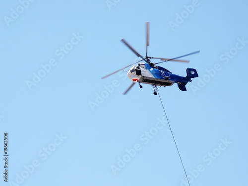 Fire helicopter with twin coaxial rotor photo