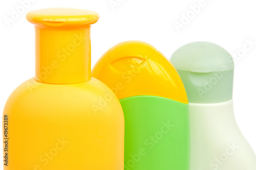 Three shampoo bottles isolated on white