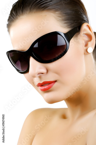 Woman in sunglasses glamour portrait.