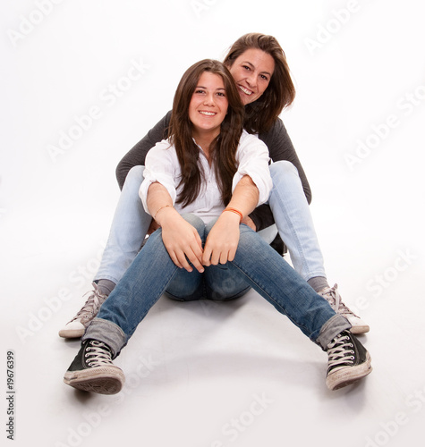 Happy teenager and her mother