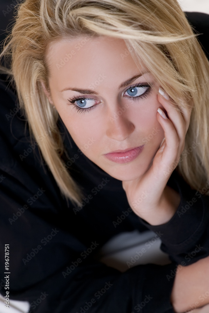 Beautiful But Sad Young Blond Woman With Blue Eyes Beautiful But Sad Young Blond Woman With Blue Eyes