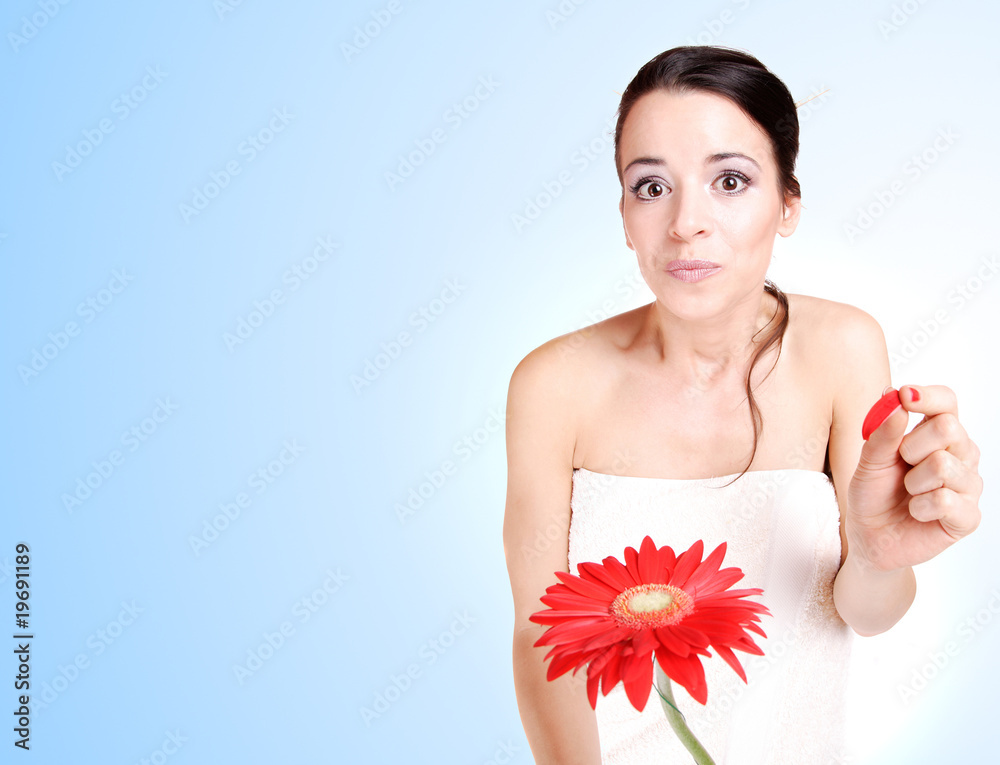Beautiful woman with flower isolated on white