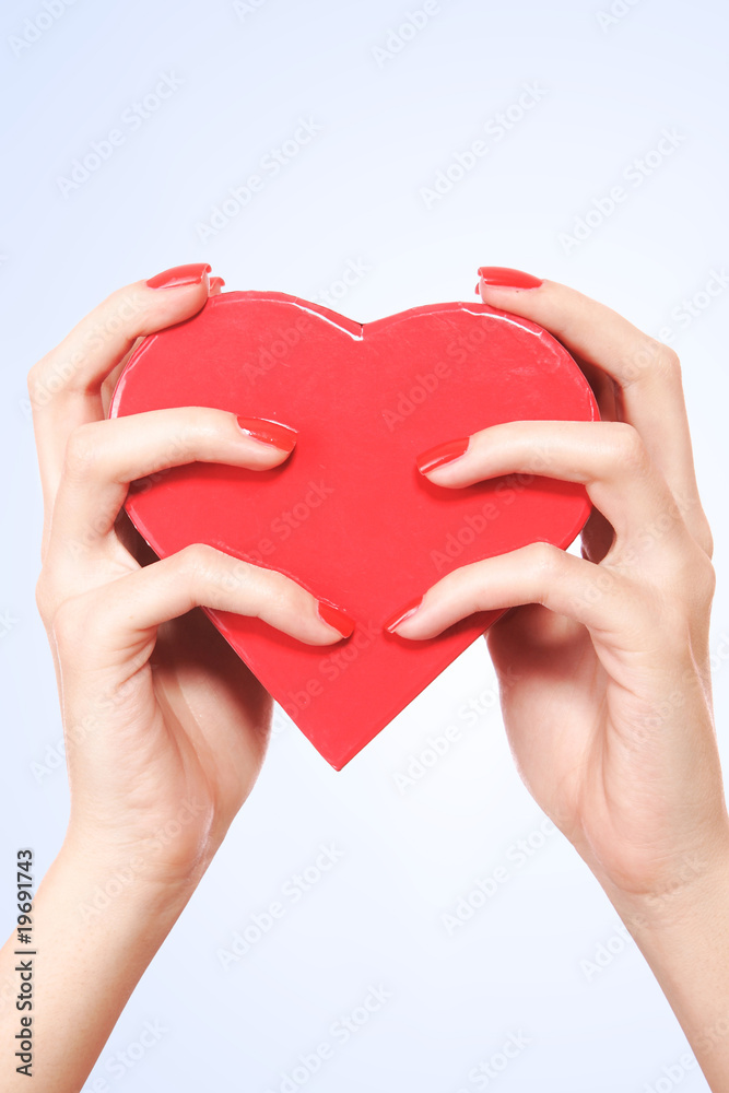 Fototapeta premium Red heart in the hand