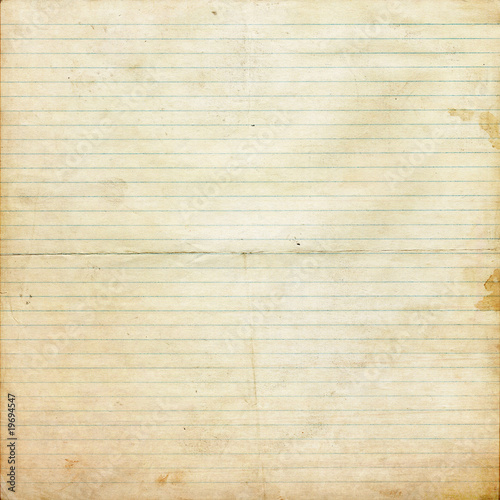 Pages of yellow legal ruled notebook pad paper