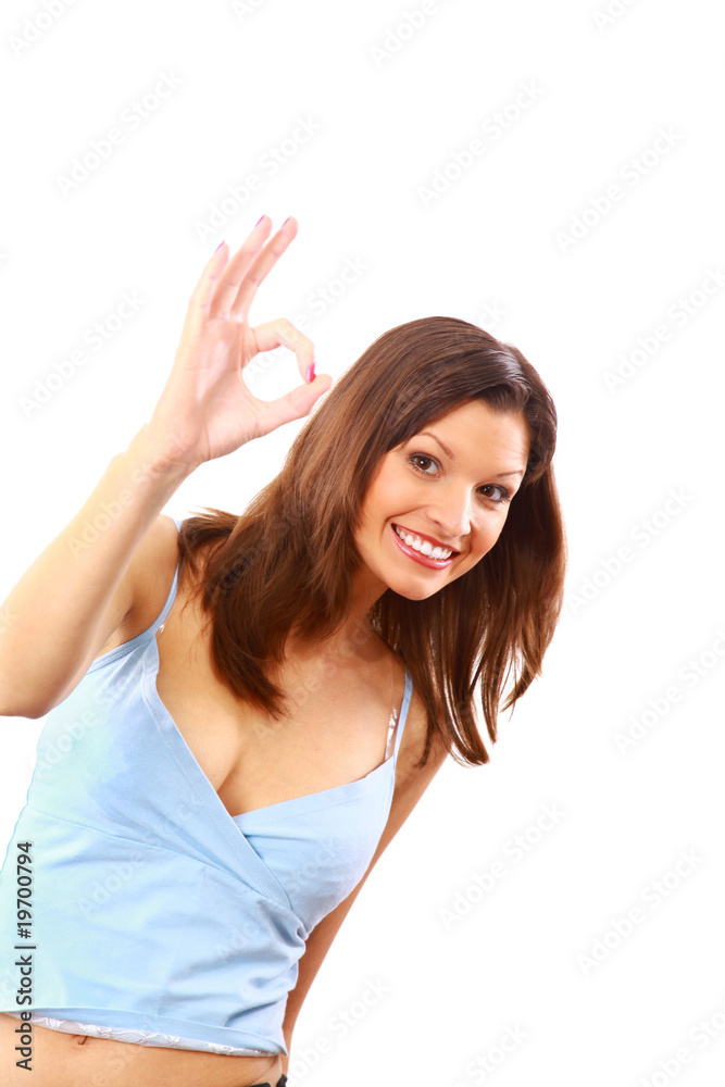 Young woman indicating ok sign. Young woman indicating ok sign.