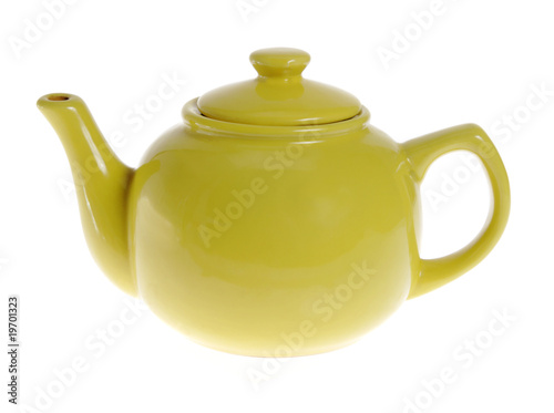 Yellow teapot on the white background