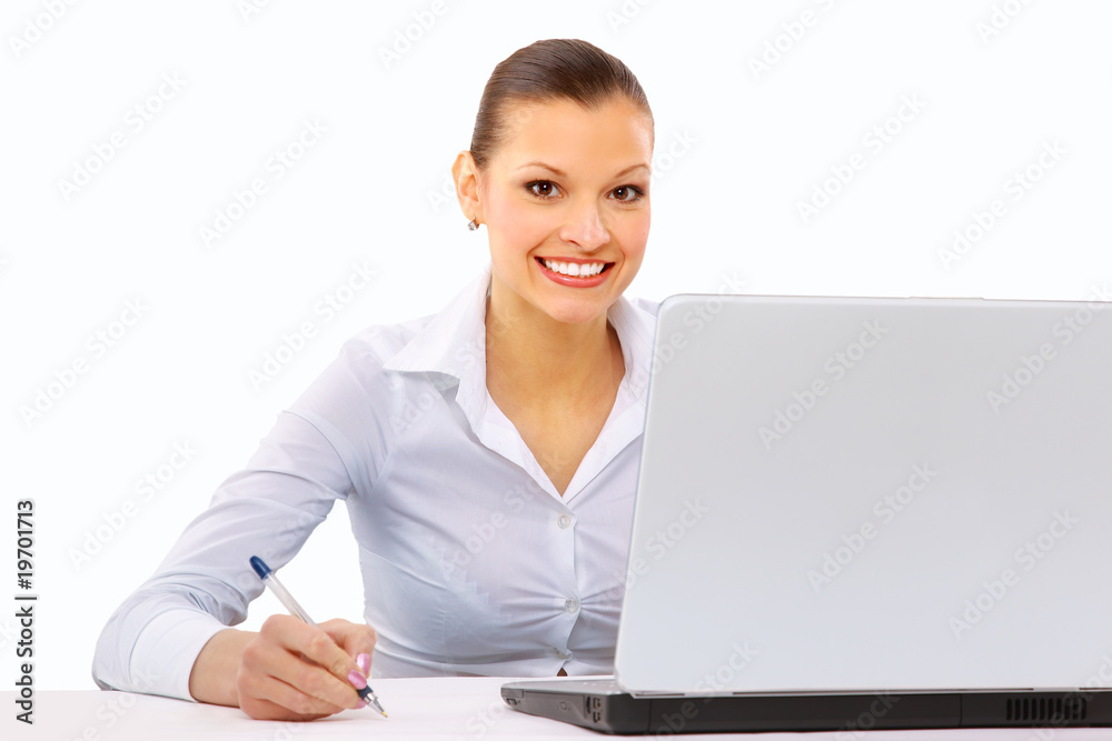 Businesswoman working at desk, isolated on white.. Businesswoman working at desk, isolated on white..