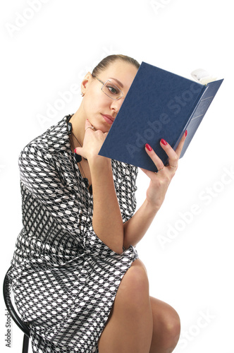 Foto Cute woman reading a book