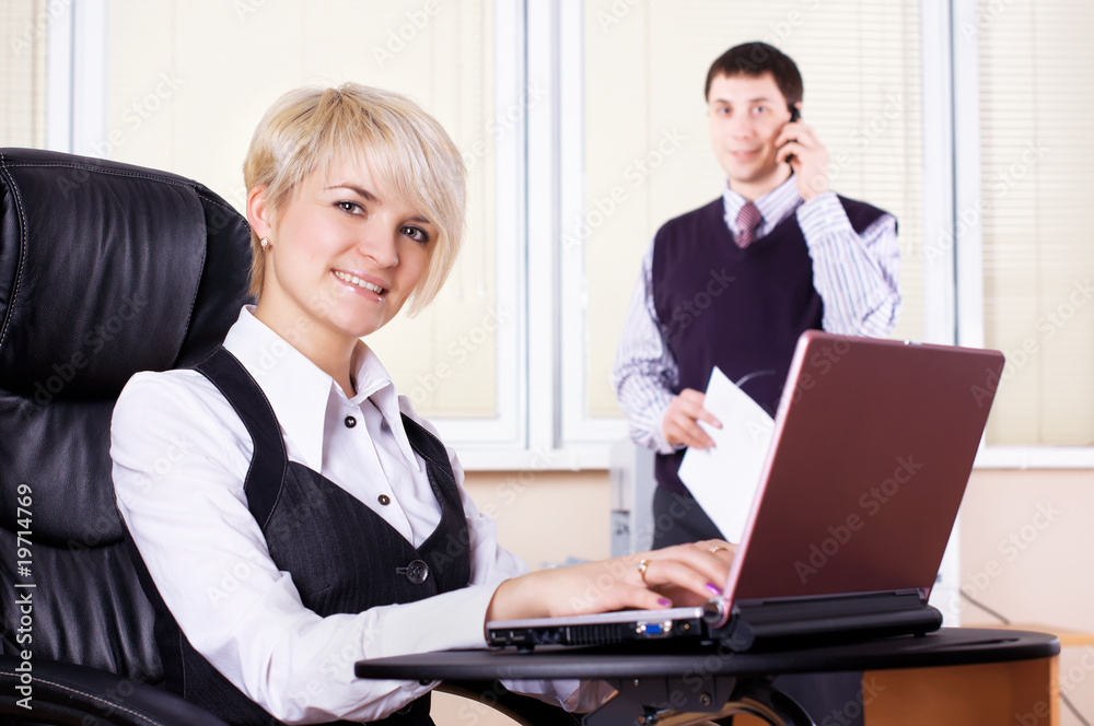 The charming young business woman The charming young business woman