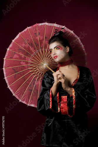Sexy japanese geisha looking sideways