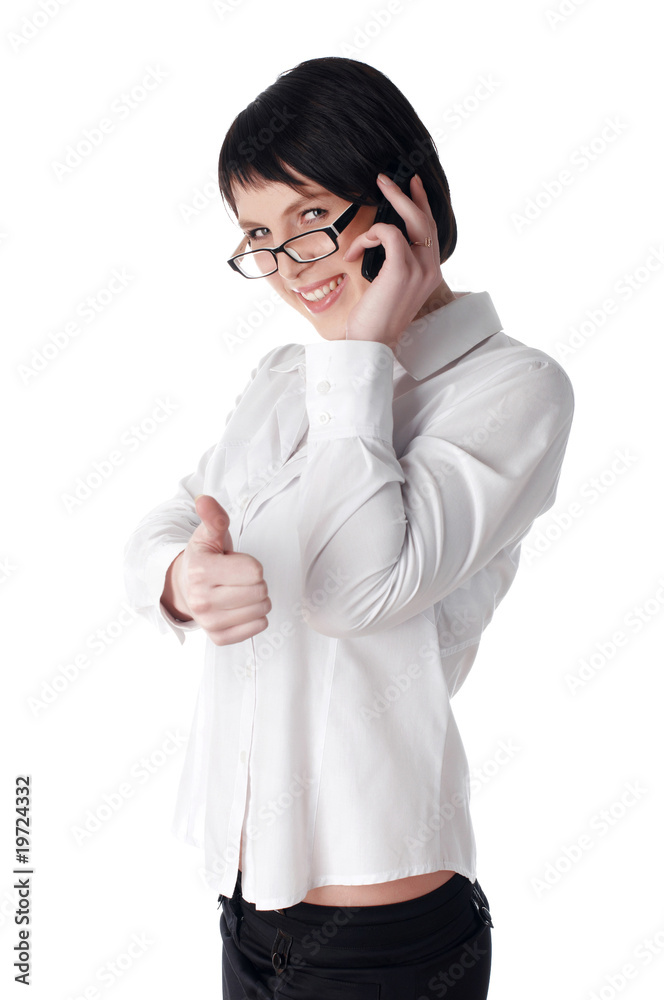 The charming young business woman in a white shirt The charming young business woman in a white shirt