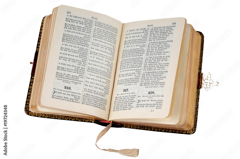 Obraz premium Open old Bible on white, with clipping path