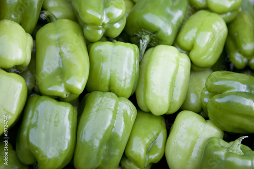 Green sweet peppers background photo