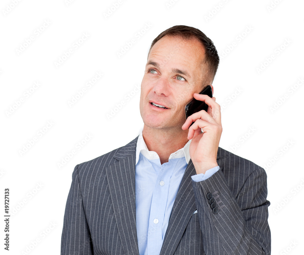 Confident mature businessman talking on phone Confident mature businessman talking on phone