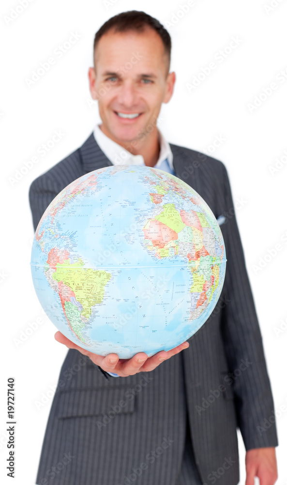 Cheerful businessman holding a terreatrial globe Cheerful businessman holding a terreatrial globe