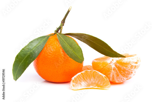 Tangerine with segments on a white background