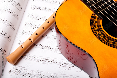 Wooden flute and classic acoustic guitar