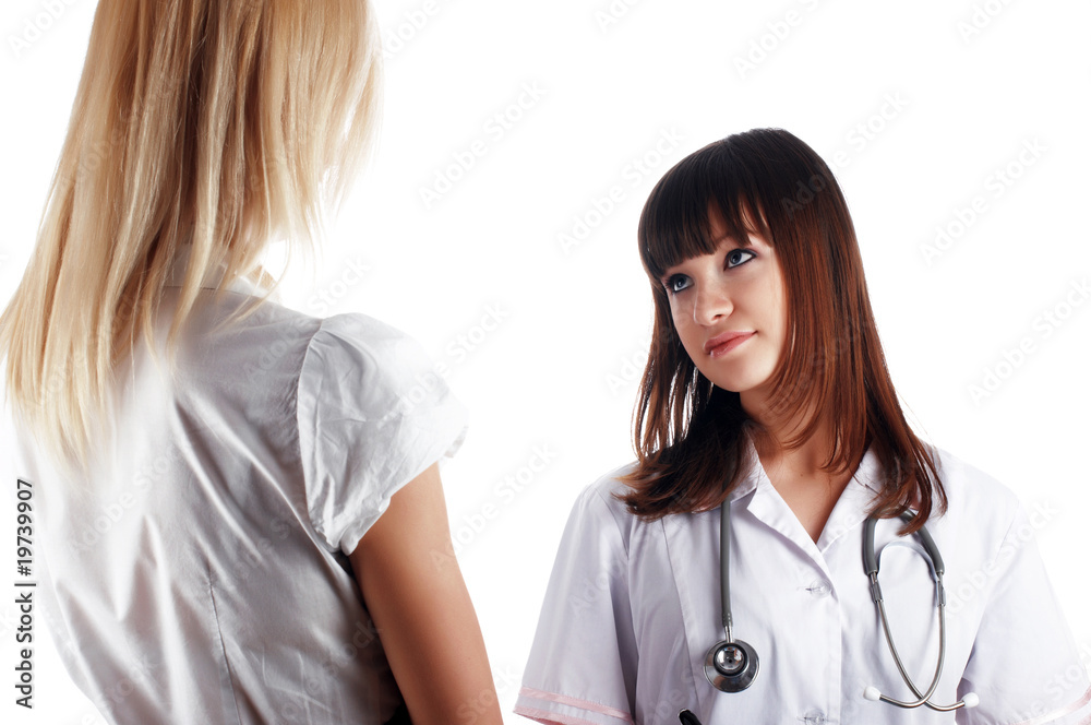 The young charming staff nurse with patient The young charming staff nurse with patient